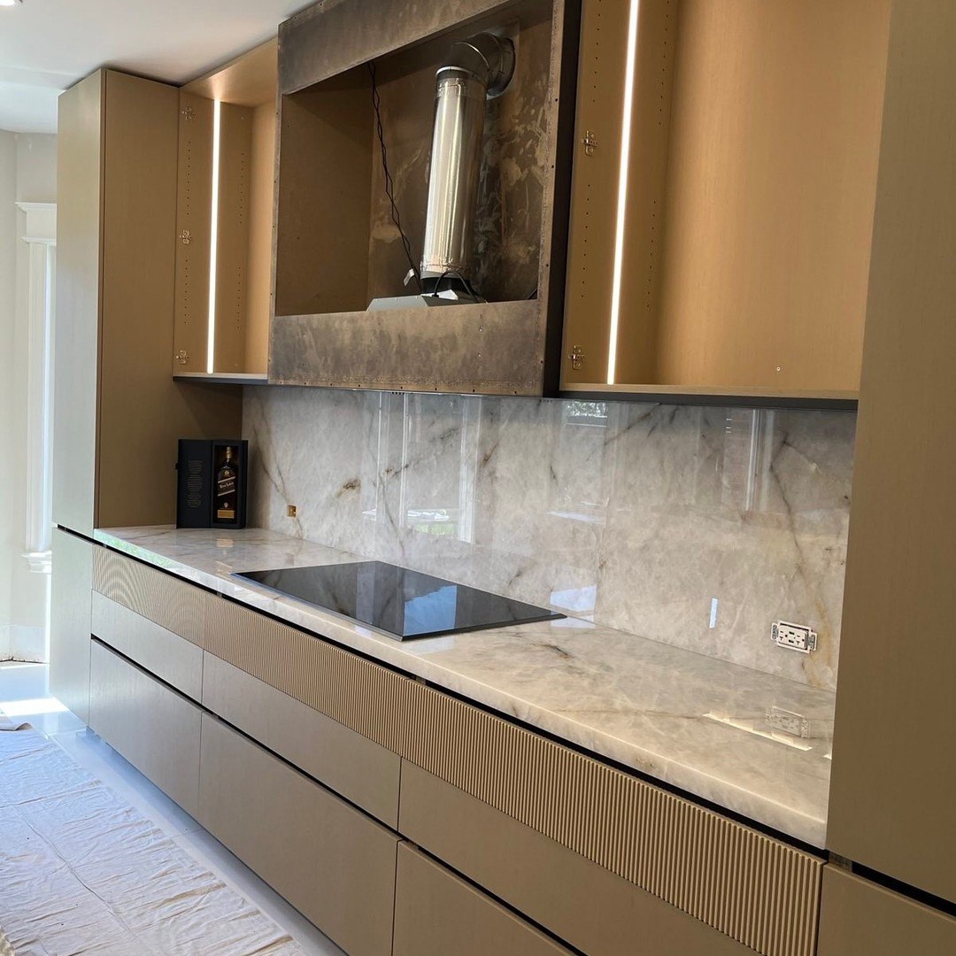 Built-in kitchen cabinetry and appliance integration completed during residential millwork installation in Toronto
