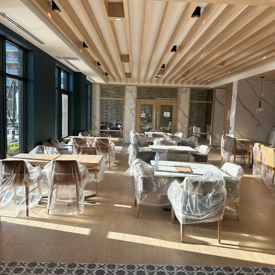 Custom decorative wood slat ceiling installation in North York commercial restaurant