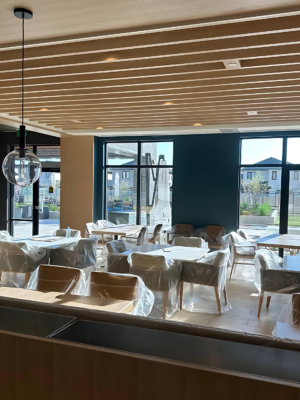 Wood slat ceiling millwork installation in restaurant interior in Toronto and GTA